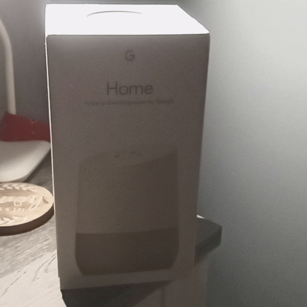 Home Voice -activated speaker by Google